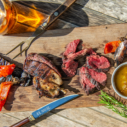 Char-grilled duck with vegetables